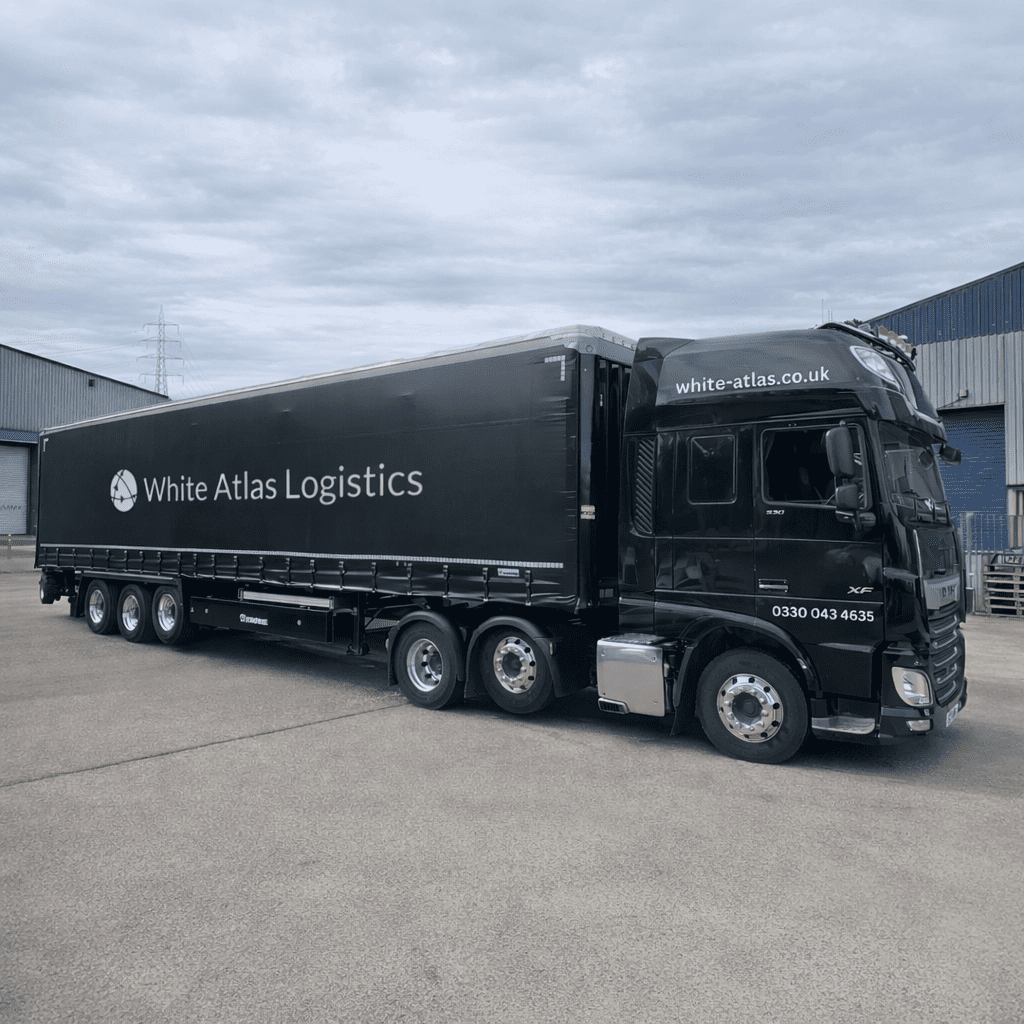 White Atlas Logistics articulated lorry providing nationwide transport and logistics services across the UK
